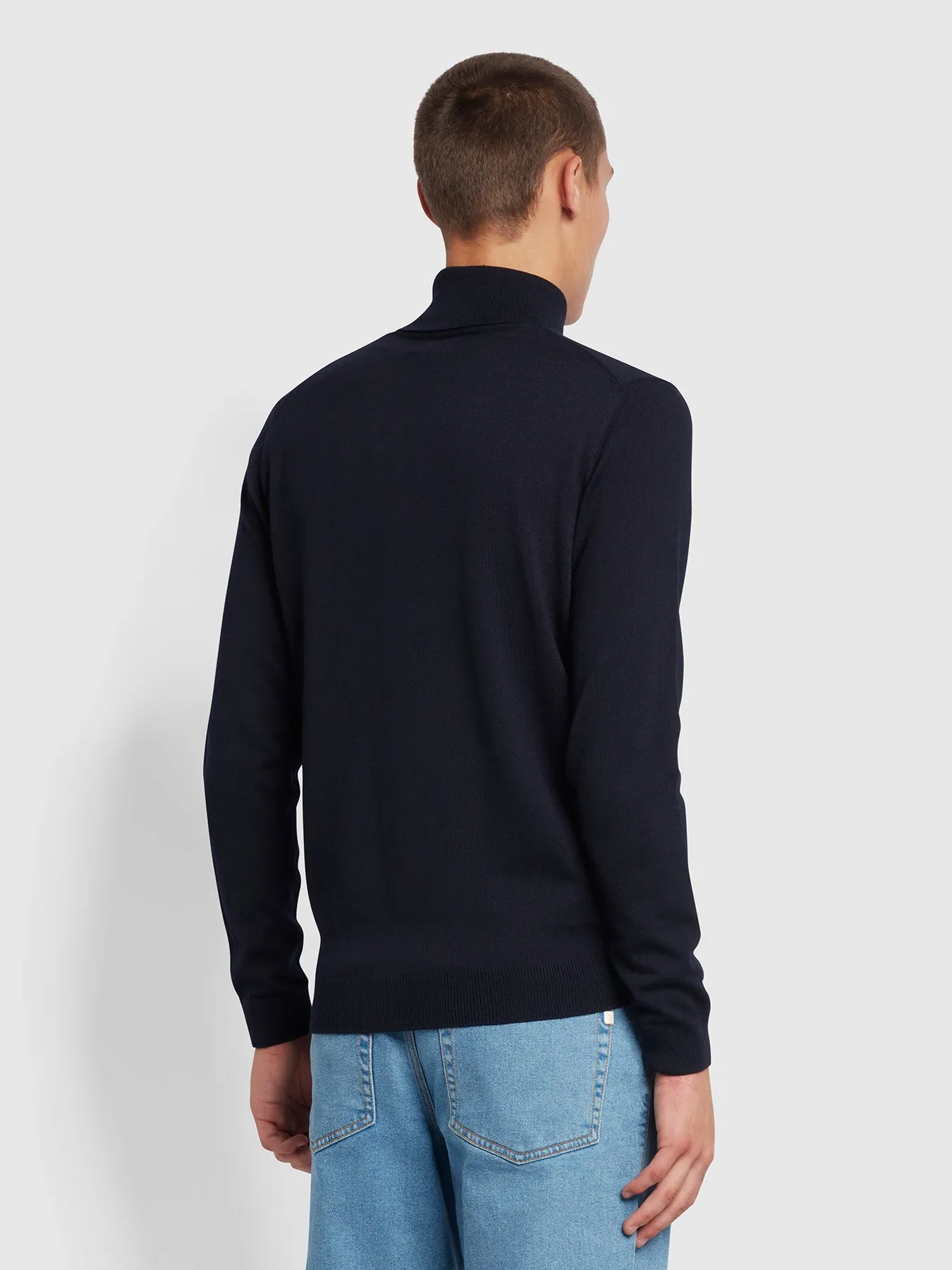 Gosforth Slim Fit Roll Neck Jumper In True Navy