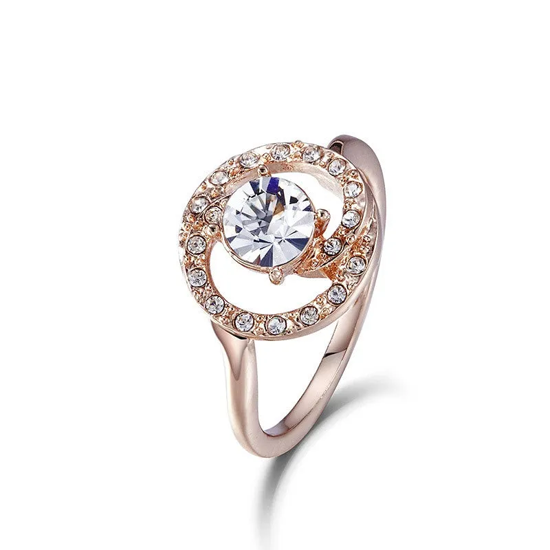 The golden little white crystal ring